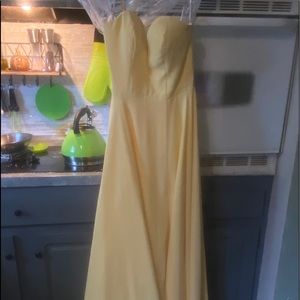 Never worn formal/prom dress pale yellow.